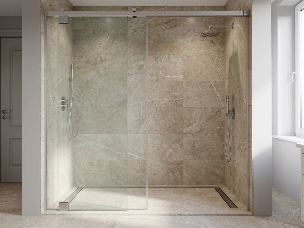 Douche à l'italienne accessible avec porte coulissante large et seuil bas